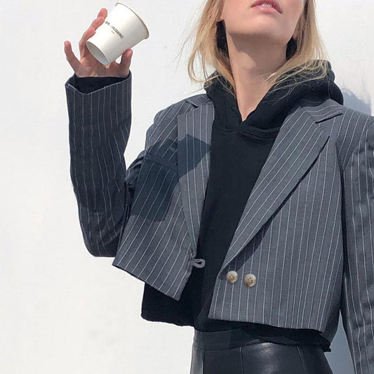 The Woman With The Navel-Baring V-Neck Blazer
